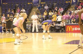 Freshman libero Lauren Waclawczyk [left] and senior libero Elena Martinez prepare for a serve during the Tigers&#8217; 3-2 loss to Florida on Oct 24.