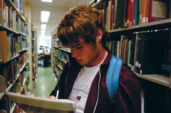 Brian Martin, mass communication freshman, went to Middleton Library on Wednesday afternoon to check out the books he needs for one of his classses.