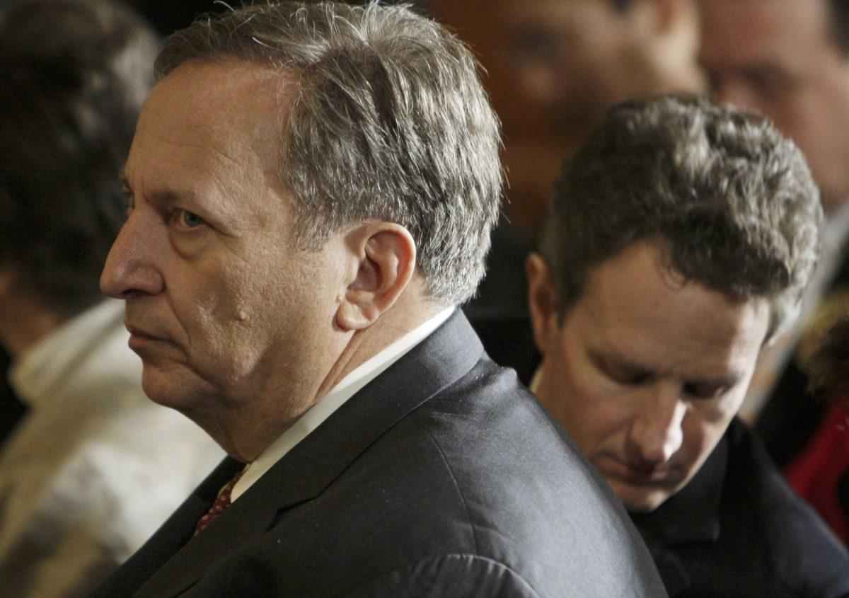 Tim Geithner [right] and Lawrence Summers await the arrival of the President Barack Obama on Friday in the White House.