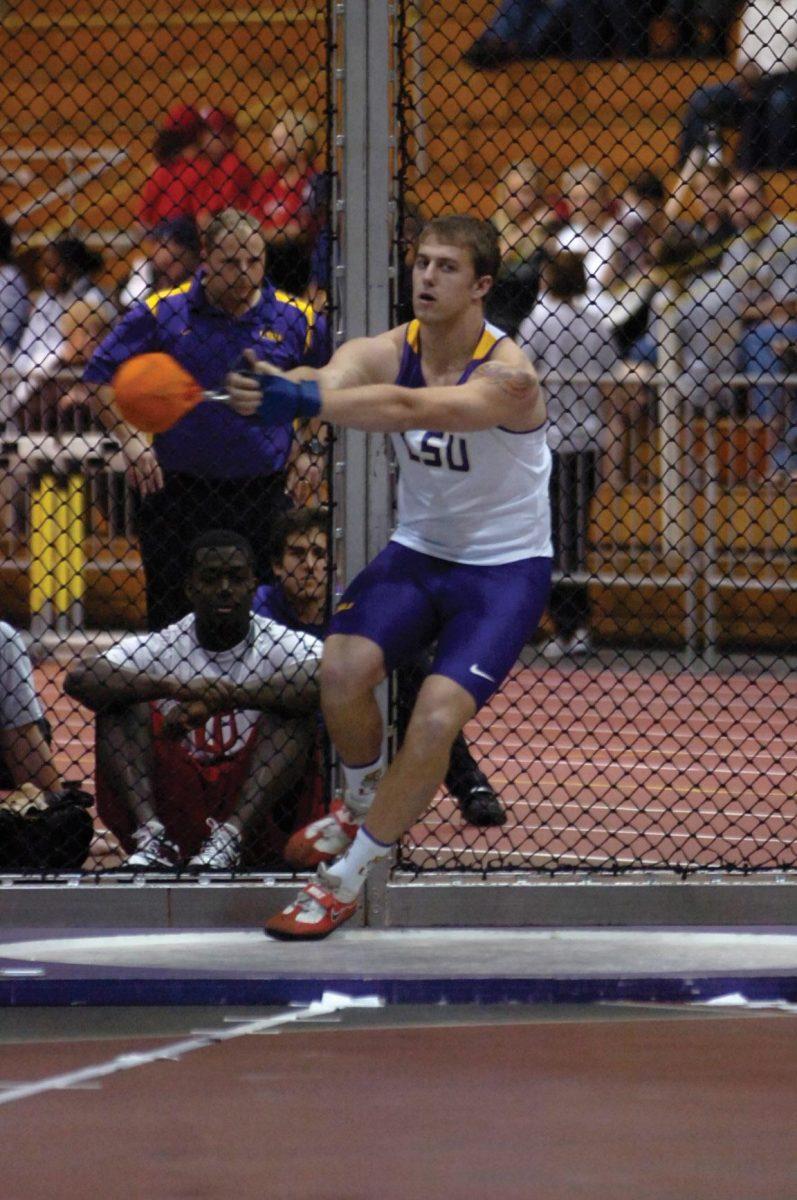 Sophomore Walter Henning sets a new LSU record in the men&#8217;s weight throw Jan. 23 during his first track-and-field meet in the Carl Maddox Field House.