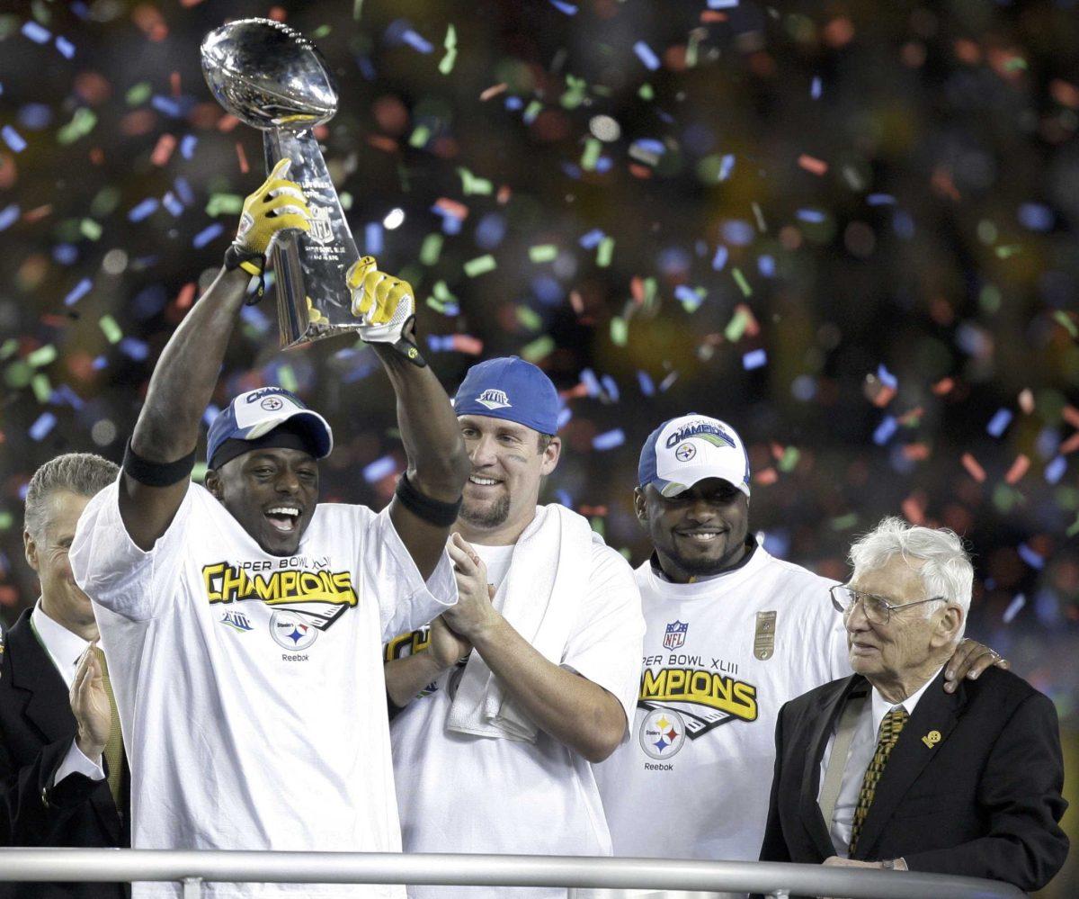 Steelers wide receiver Santonio Holmes, quarterback Ben Roethlisberger, coach Mike Tomlin and team owner Dan Rooney celebrate the Steelers defeat of the Arizona Cardinals, 27-23, in Super Bowl XLIII on Sunday in Tampa, Fla.