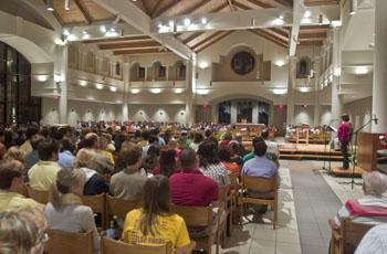 Members of Christ the King church attend mass Sunday. Unconventional worship groups such as Chapel on Campus are becoming popular with students.