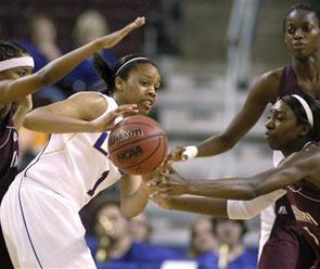 LSU's Katherine Graham (1) is pressured by Mississippi State's Donnisha Tate (3) and Mississippi State's Chanel Mokango of Congo, top right, during the second half of an NCAA college basketball game at the Southeastern Conference women's tournament in North Little Rock, Ark., Friday, March 6, 2009. LSU defeated Mississippi State 63-58.