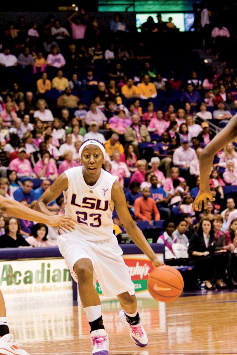 LSU guard Allison Hightower dribbles down the court Feb. 15 against Florida in the PMAC. The Lady Tigers won 66-47.