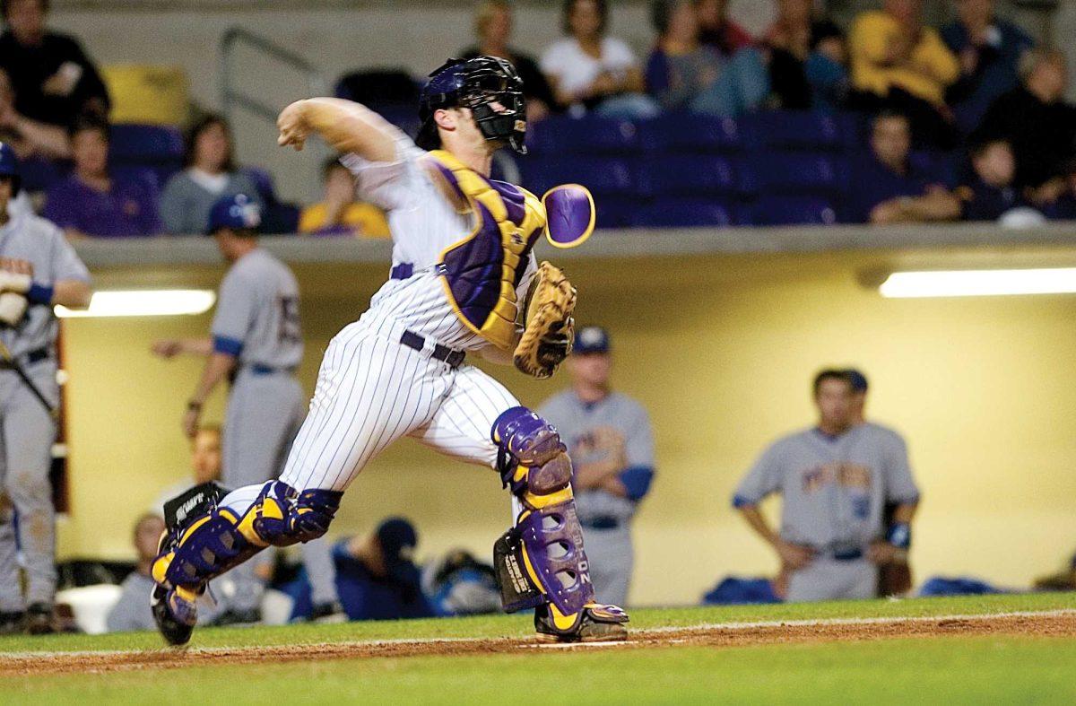 Sophomore catcher Micah Gibbs throws the ball Wednesday during LSU&#8217;s game against McNesse State. LSU faces Harvard tonight in Alex Box Stadium.