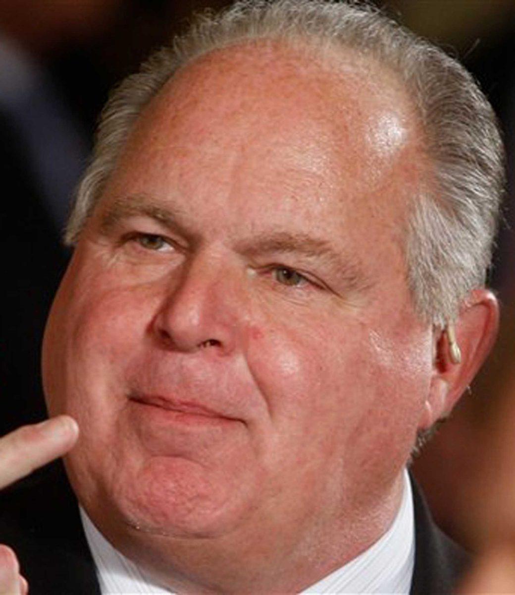 In this Jan. 13, 2009 file photo, conservative talk show host Rush Limbaugh talks with guests in the East Room of the White House in Washington. Limbaugh has been Topic A in the political world, with Republicans debating his influence on their party and Democrats trying to elevate the conservative radio host to the GOP's de facto spokesman.