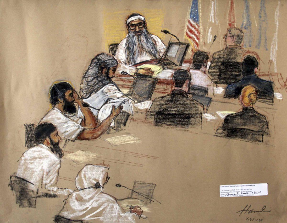 In this courtroom sketch, the Sept. 11, 2001, attack co-defendants sit during a hearing Monday at the U.S. Naval Base in Cuba.