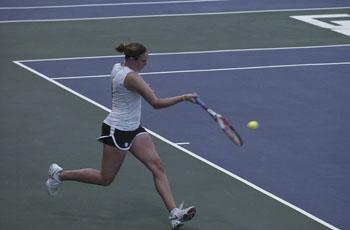 LSU freshman Whitney Wolf returns the ball Wednesday evening during her singles match. She defeated Oregon&#8217;s Pavlina Smatova in straight sets, 6-2, 6-2.