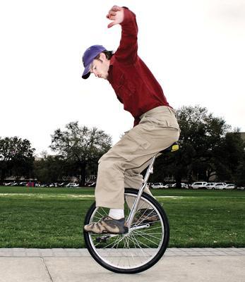 Matthew Huber, geology graduate student, balances on his unicycle Saturday on the Parade Ground. Huber taught himself to ride the unicycle after he received one for Christmas as a joke and now uses it as his main form of transportation.