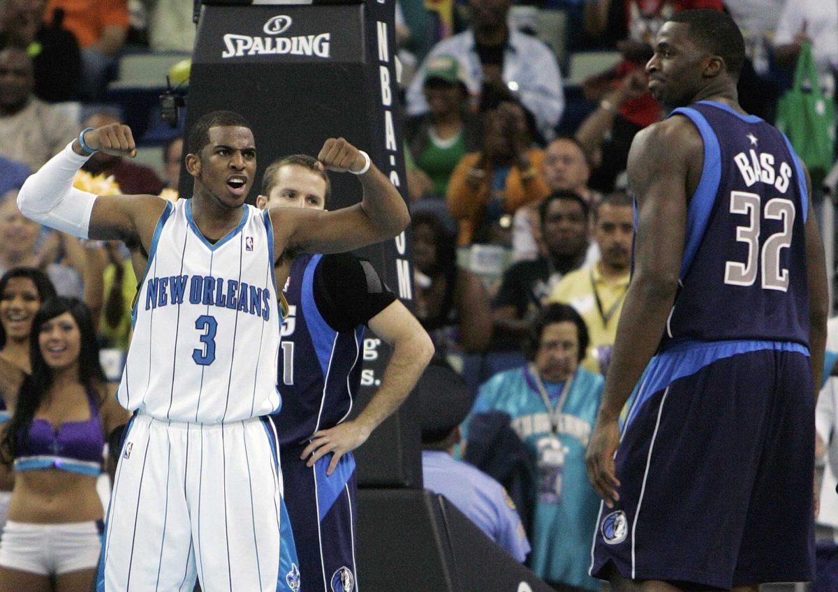 New Orleans Hornets guard Chris Paul flexes his muscles in the second half of their basketball game against the Dallas Mavericks in New Orleans on Sunday.