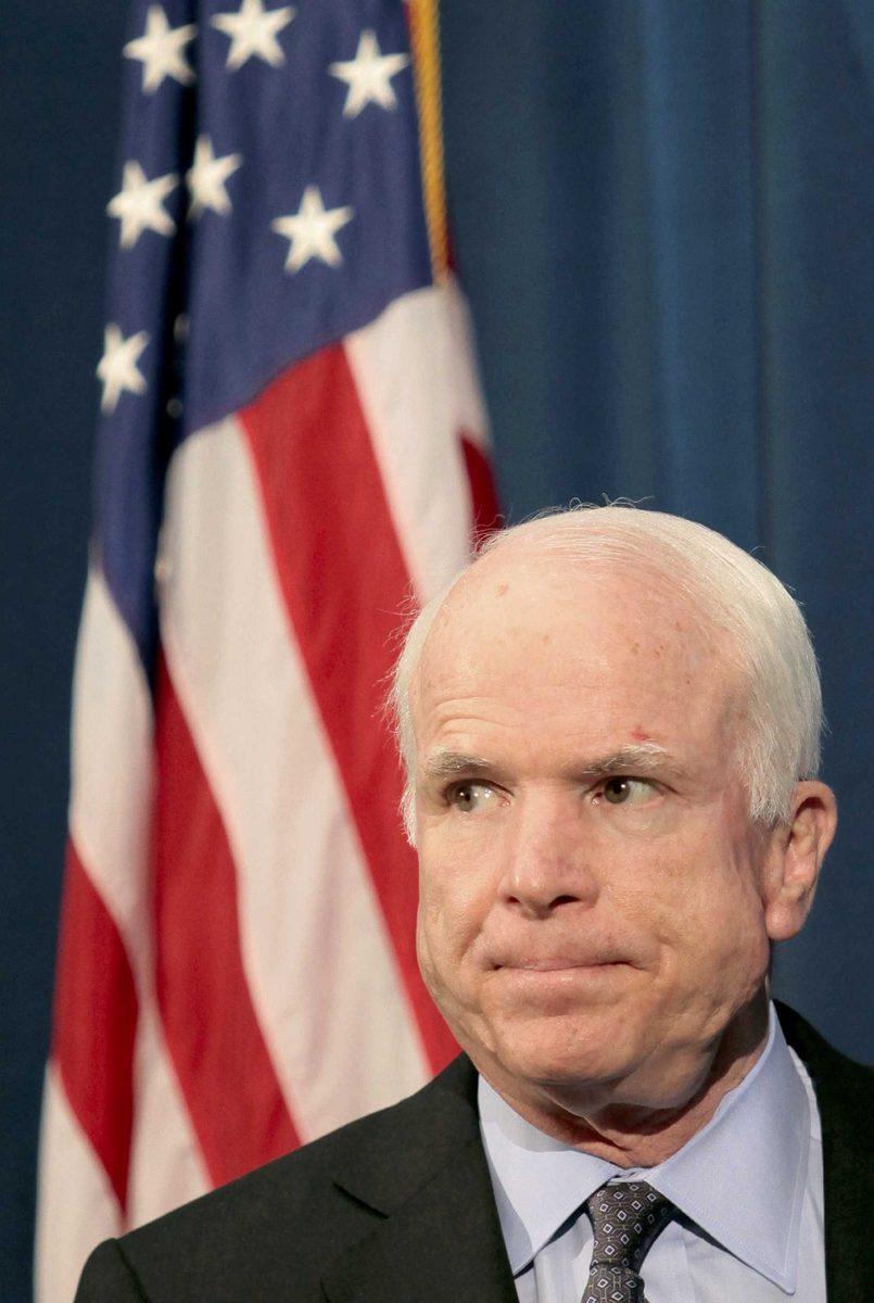 U.S. Sen. John McCain arrives at a news conference at the US Embassy in Tokyo, Japan, April 10. McCain is one of many politicians using Twitter to communicate with people.