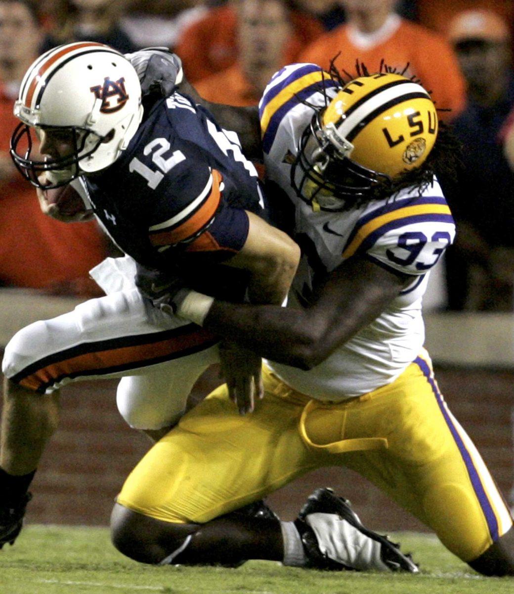 In this Sept. 20, 2008 file photo, LSU defensive end Tyson Jackson (93) sacks Auburn quarterback Chris Todd (12) during the first half of an NCAA college football game in Auburn, Ala. Jackson is a top prospect in the 2009 NFL Draft.