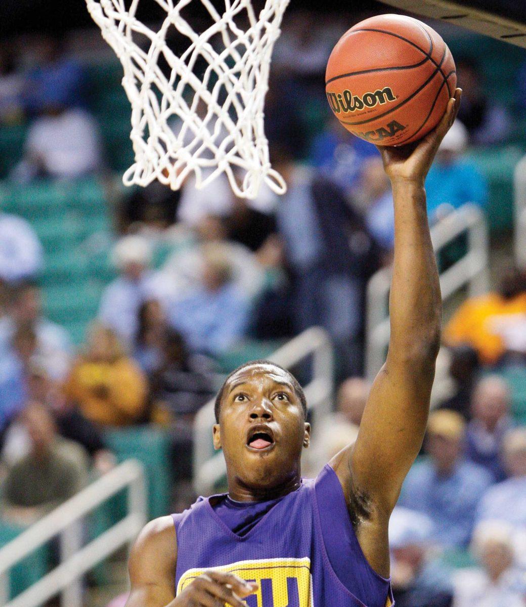 LSU's Tasmin Mitchell shoots during a basketball practice in Greensboro, N.C., Wednesday, March 18, 2009. LSU plays Butler in the first round of the men's NCAA college basketball tournament on Thursday.