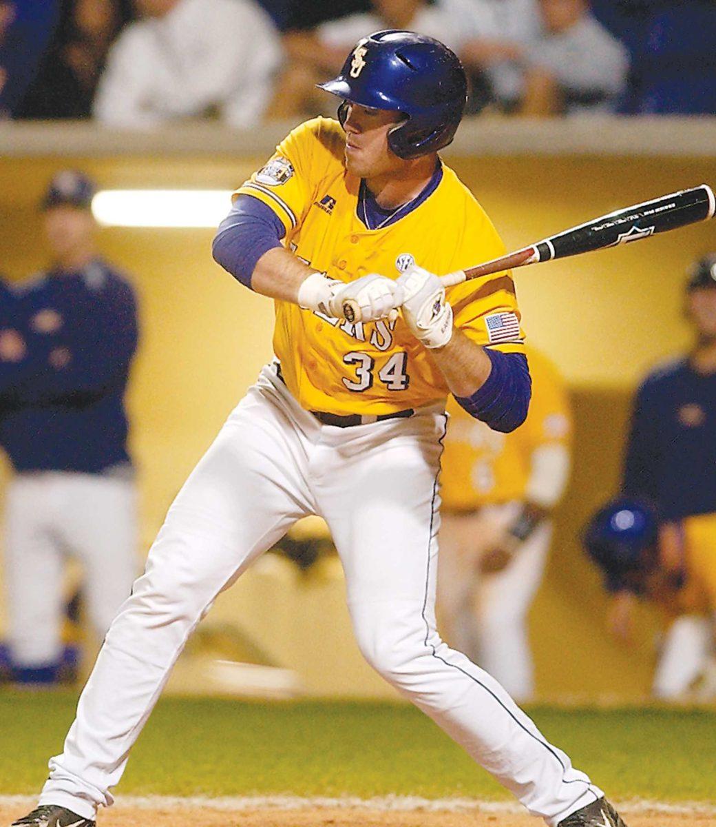 Junior outfielder Blake Dean swings the bat Tuesday during the Tigers&#8217; win against UNO. Dean&#8217;s three-run home run in the third inning helped the Tigers top the Privateers, 8-6.