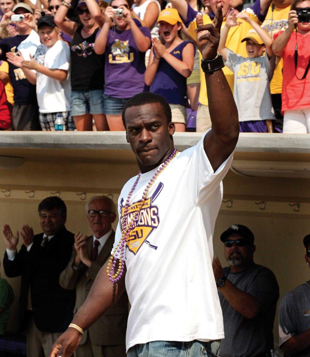 LSU junior outfielder Jared Mitchell waves to the crowd at Alex Box Stadium on Friday during the celebration of LSU's 2009 national championship.