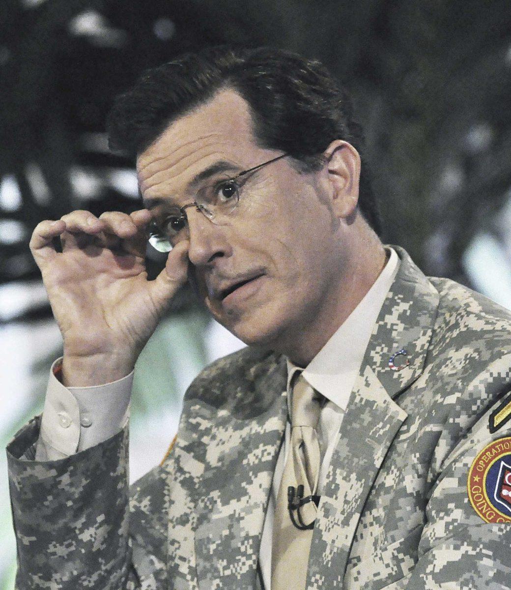 In this handout taken Sunday, June 7, 2009, released by the U.S. military, comedian Stephen Colbert, from the Comedy Central television program, taping the first of four shows in front of U.S. soldiers at Camp Victory in Baghdad, Iraq.