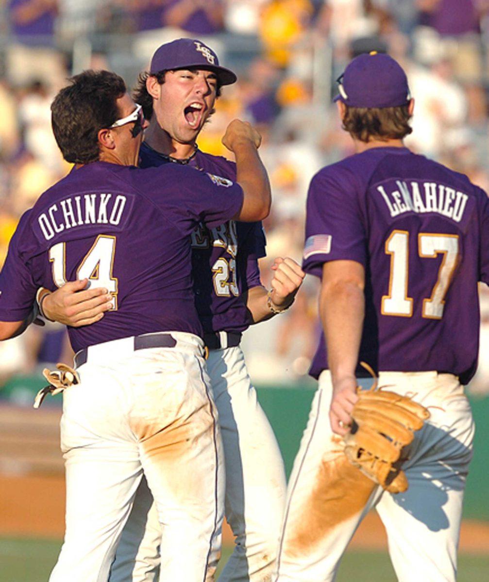 Anthony Ranaudo, Sean Ochinko and DJ LeMahieu celebrate after the Tigers' win against Rice, 5-3. The Tigers now advance to the College World Series in Omaha, Neb.