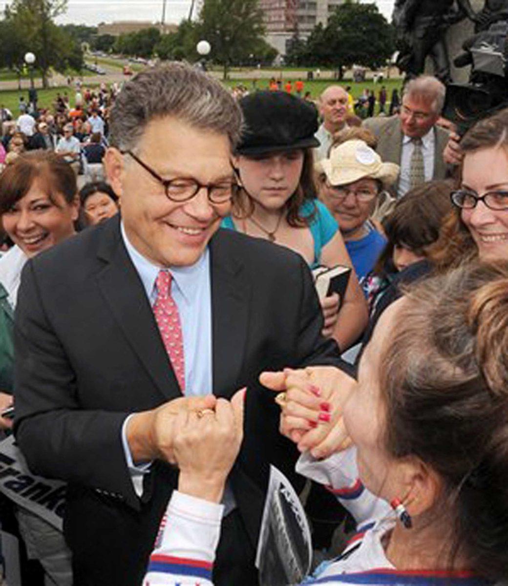 Sen.-elect Al Franken, D-Minn., shakes hands with supporters during a rally at the mall of the Minnesota State Capitol in St Paul, Minn., Wednesday, July 1, 2009