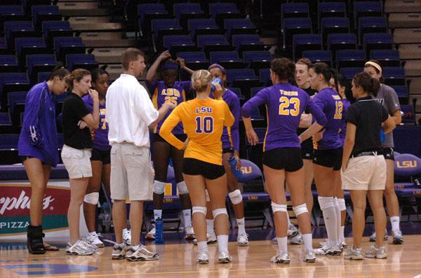 LSU's volleyball team huddles during a timeout during their match against Tulane in the LSU Spring Invitational Tournament.