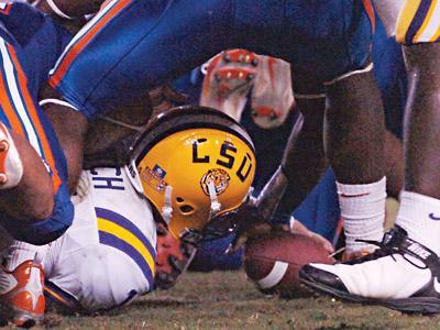 Former LSU quarterback Andrew Hatch tries to recover a loose ball Oct. 25 against Florida. The Tigers had a -1 turnover margin last season - No. 6 in the SEC, No. 67 nationally.