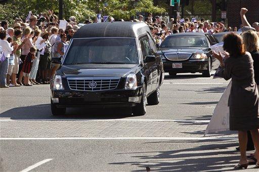 A hearse carrying the body of Sen. Edward M. Kennedy, D-Mass., travels along Atlantic Avenue en route to the John F. Kennedy Presidential Library in Boston, Thursday afternoon, Aug. 27, 2009. Kennedy died late Tuesday night of brain cancer.