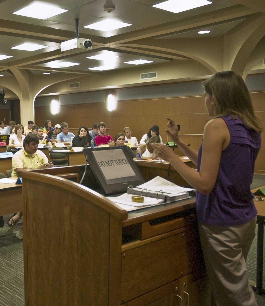 Melissa Hart, SG director of athletics, addresses the student government Wednesday about LSU sports issues during their first meeting of the fall semester in the new Senate Chambers.