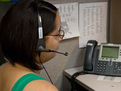 Psychology senior Tonya Aubrey answers calls Monday evening on the 24-hour volunteer crisis help line at the Baton Rouge Crisis Intervention Center.