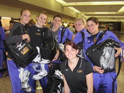 The volleyball team waits in a Nebraska airport. They could not get a flight to New Orleans because of Hurricane Gustav. Instead they flew to Tennessee to wait out the hurricane.