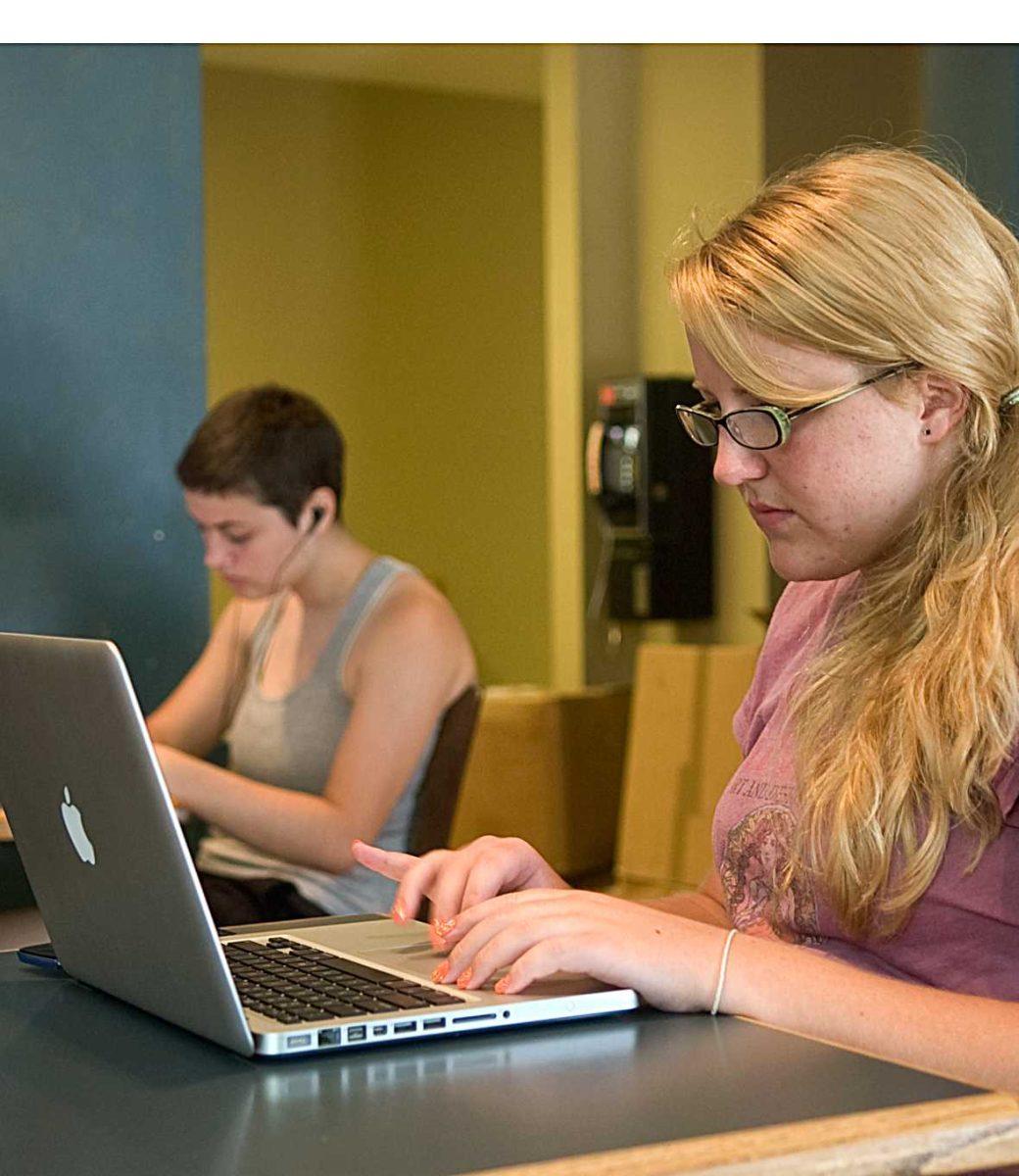 Environmental science and coastal studies freshman Rachel Kearns uses the free wireless at Highland Coffees on Aug. 25.