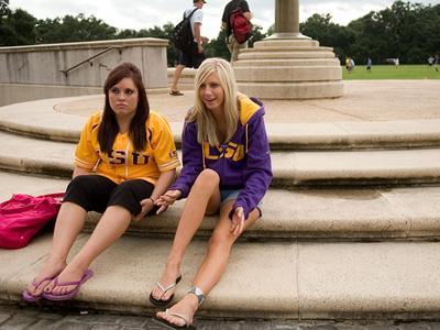 Psychology junior Annie Gullickson (left) and criminal justice junior Kelly Wilson (right) discuss their experience as exchange students.