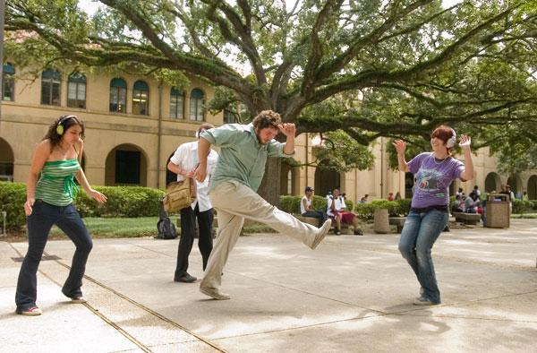 University students dance in the Quad on Wednesday afternoon. More than 60 students participated in an organized flashmob dance party in the Quad.