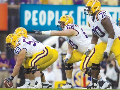 Sophomore offensive guard Josh Dworaczyk (68) gets ready before the snap Saturday.