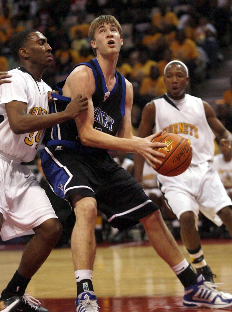 Country Day's Matt Derenbecker, looks to shoot during the 1A State Championship in March. Derenbecker committed to the Tigers in July.