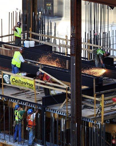 Ironworkers use torches to cut steel Sept. 2 at the World Trade Center in New York. Thursday will be the eighth anniversary of the attacks that destroyed the buildings.