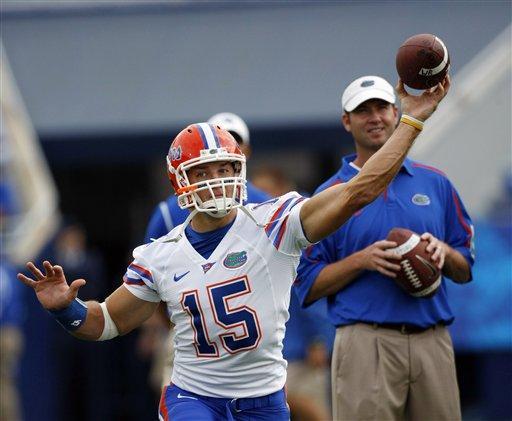 Florida quarterback Tim Tebow warms up prior to his team's NCAA college football game against Kentucky in Lexington, Ky., Saturday, Sept. 26, 2009.