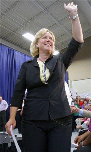 Louisiana Sen. Mary Landrieu, D-La., waves to the crowd as she enters the hall where she is holding a health care town hall meeting in Reserve, Thursday, Aug. 27, 2009.