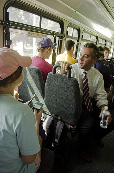 Vice Chancellor of Student Life, Eric Monday, answers mass com junior Robbie Petro, political communications sophomore Mallory Logan, and political science senior Blake Bougious questions about the new bus system during his Mondays with Monday meetings witht he students.