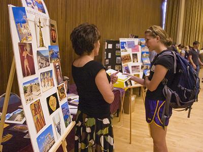 Michelle Zerba, English professor, left, speaks with A&#8217;dair Flynt, nutritional sciences sophomore, about international opportunities Wednesday at the Study Abroad Fair.