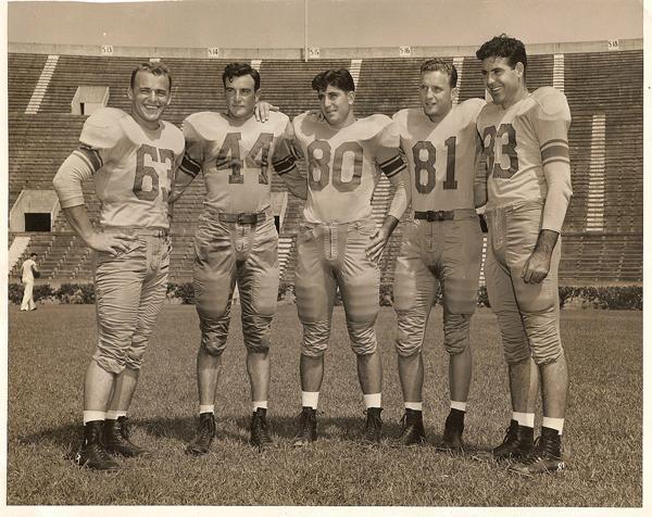 [From left] Former LSU Tigers Wren Worley, Dale Gray, Jim Lyle, Raymond Bullock and Melvin &#8220;Sam&#8221; Lyle pose for a photo in Tiger Stadium during the 1949 season.