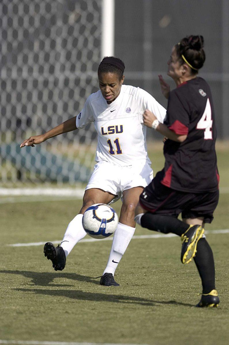 LSU senior defender Chelsea Potts kicks the ball past South Carolina sophomore forward Kayla Grimsley during the Tigers' 1-0 victory over the Gamecocks Sunday.