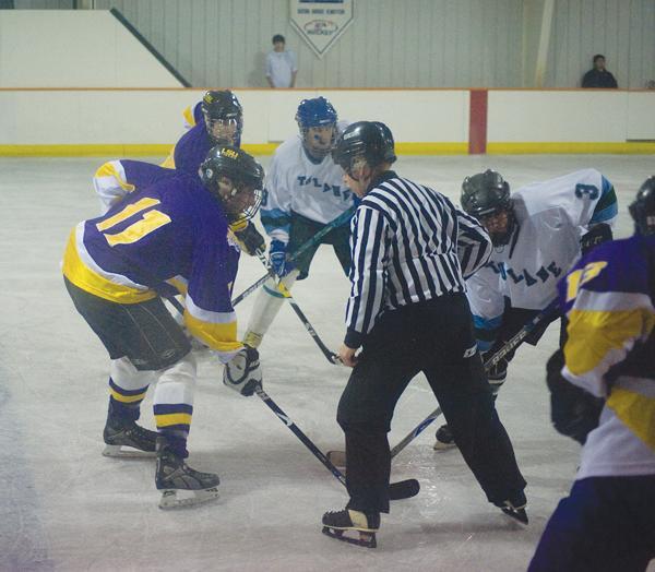 LSU senior forward Christopher Philippon faces off with a Tulane player Wednesday night at Leo&#8217;s Iceland during the Tigers&#8217; 5-4 loss to the Green Wave.