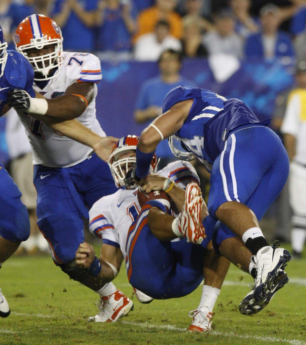 Florida senior quarterback Tim Tebow is sacked Sept. 26 by Kentucky sophomore defensive end Taylor Wyndham in Lexington, Ky. Tebow received a concussion which hospitalized him.