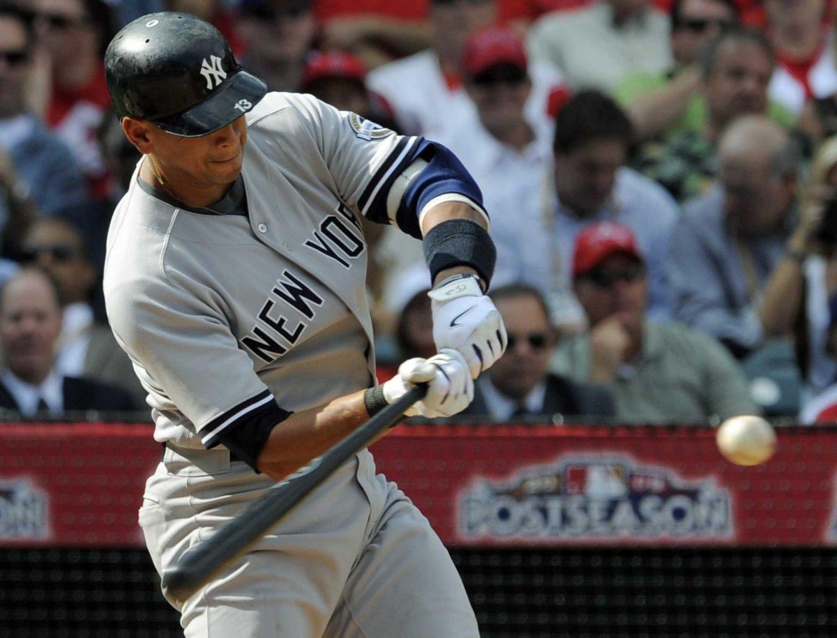 New York Yankees&#8217; Alex Rodriguez hits a home run during Game 3 of the American League Championship against the Los Angeles Angels on Monday.