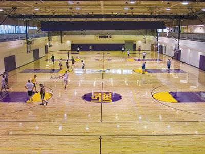 Students utilize the newly reopened basketball courts Monday at the University Student Recreation Complex gym. The courts have been closed since Hurricane Gustav.