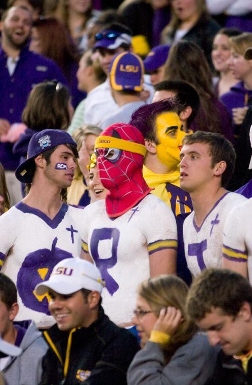 LSU fans show their support Oct. 31 against Tulane. Students dressed as pimps, the Gold Man and a purple and gold genie to cheer on the Tigers.