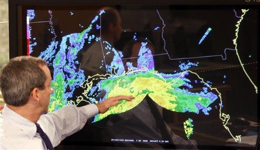 National Hurricane Center deputy director Ed Rappaport, shows the position of tropical storm Ida at the National Hurricane Center in Miami, Monday, Nov. 9, 2009.