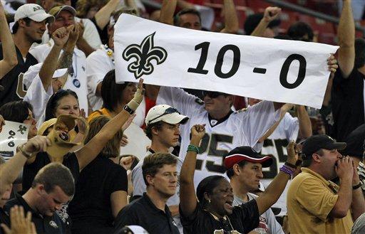 New Orleans Saints fans celebrate their team's 38-7 win over the Tampa Bay Buccaneers during an NFL football game Sunday Nov. 22, 2009 in Tampa, Fla. The team is undefeated at 10-0.