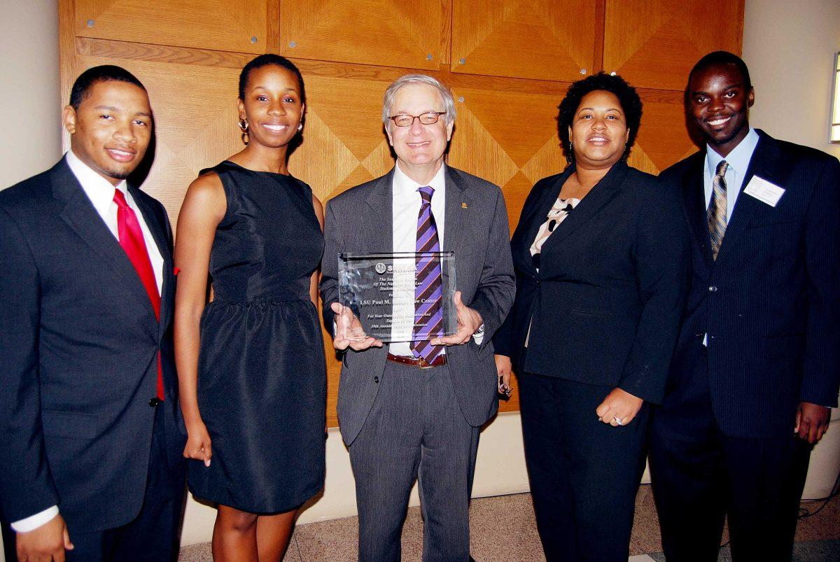 From left, LSU Law BLSA President Jonathan Brown, LSU BLSA and Southern Region BLSA Programming director Miesha Beverly, Chancellor Jack Weiss of the Paul M. Hebert Law School Southern Region BLSA Vice Chair Mechelle Bumpers, and Regional Chair of the Southern Region BLSA Cachavious Q. English. Weiss holds an award presented to the Law Center on Jan. 14 for outstanding dedication and support of the BLSA.