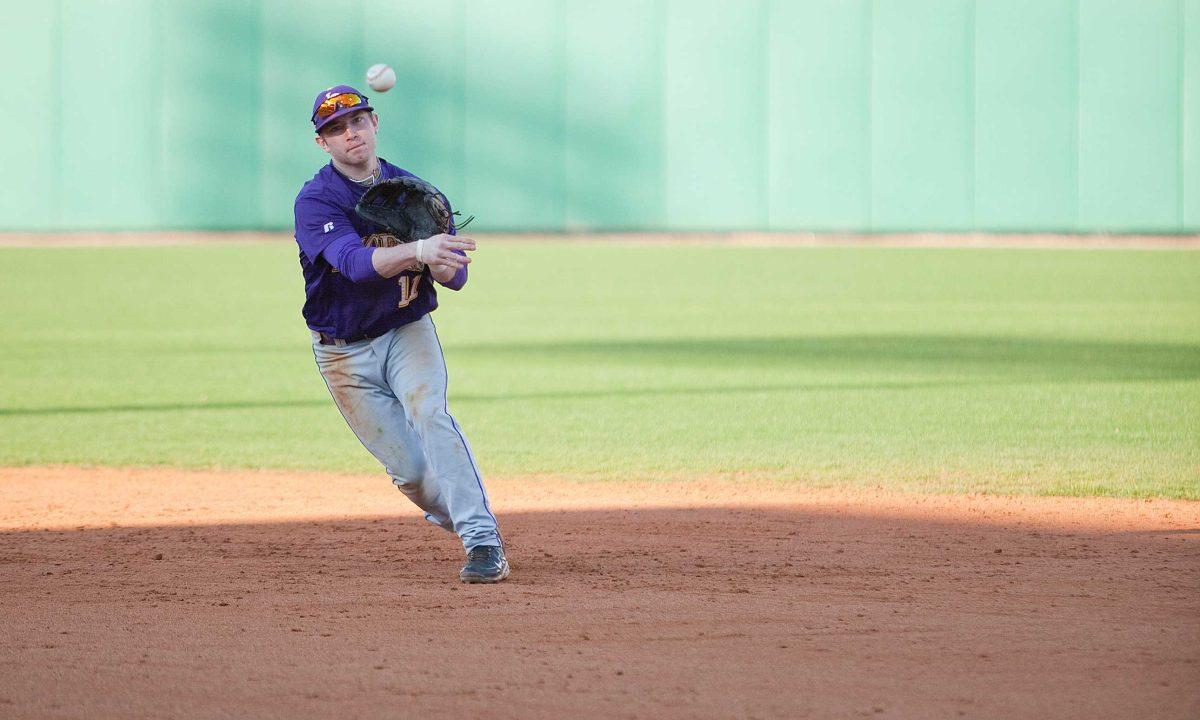 LSU sophomore infielder Tyler Hanover throws to first base during practice Feb. 2.