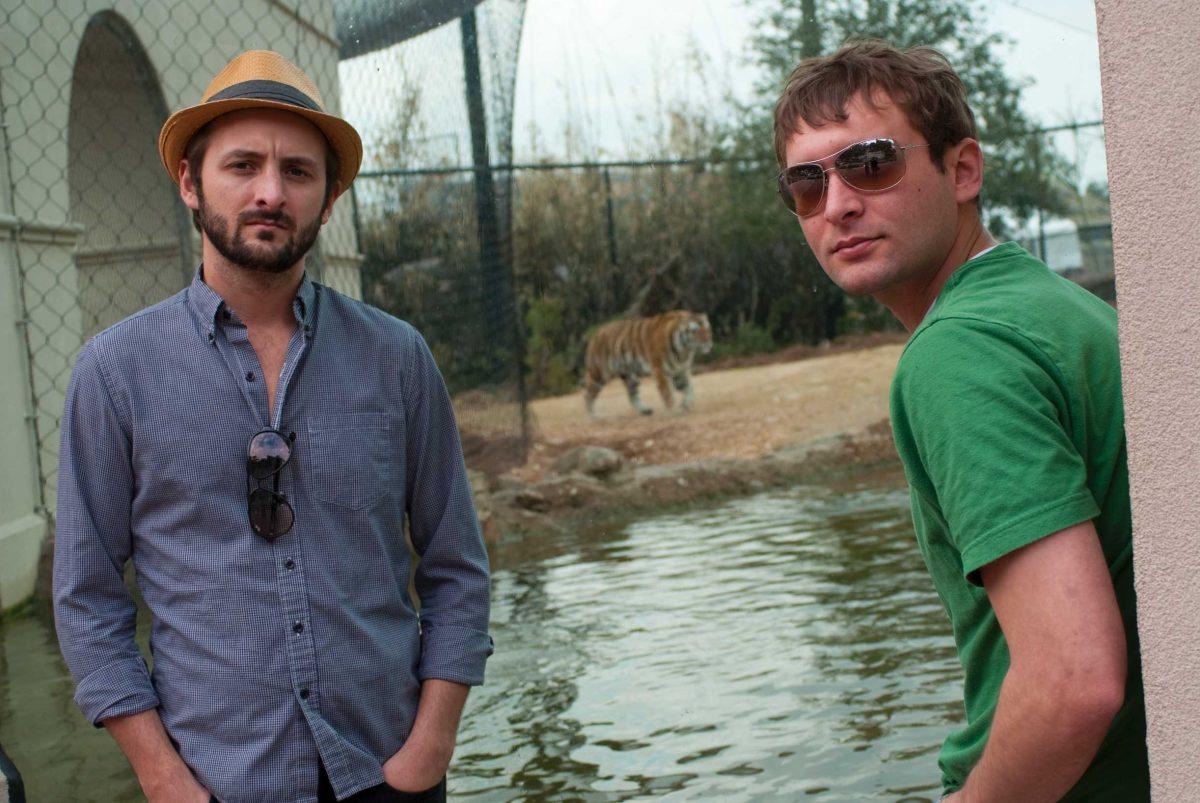 popular local band benjy Davis Project hangs out with Mike the Tiger on Monday afternoon.